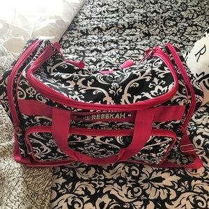 Damask print small duffel bag, removable letters